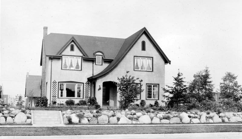 The Banfield house at 5575 Angus Drive, with a rock garden along the front