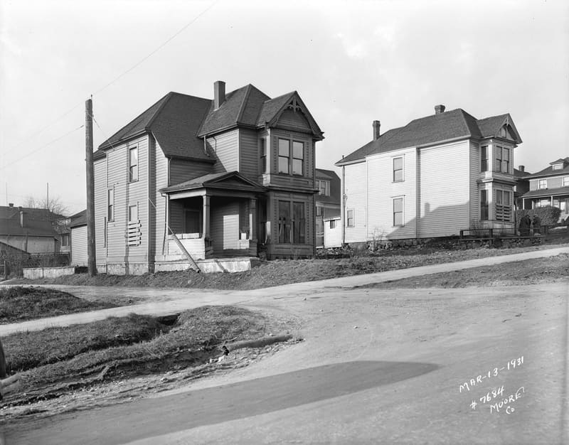 The houses at 1409 and 1425 Burrard Street, photographed before they were pulled down for the Burrard Bridge