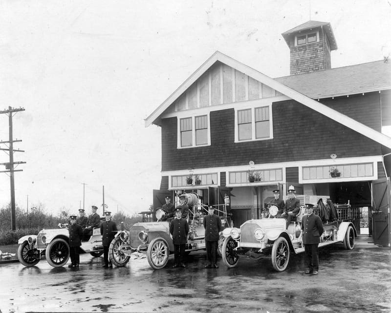 Firemen with their motor engines outside the Point Grey fire hall at Cartier Street and 38th Avenue