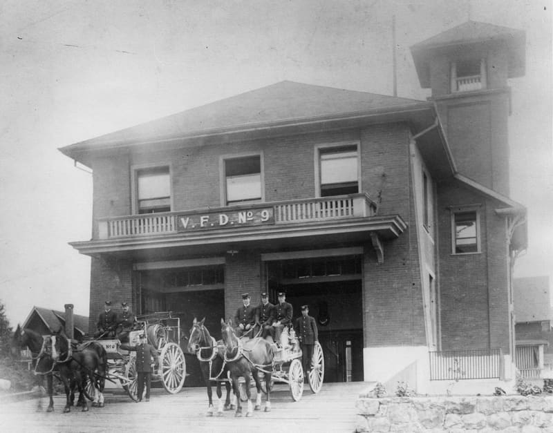 Firefighters with their horse-drawn wagons in front of Firehall No. 9 at Salsbury Drive and Charles Street