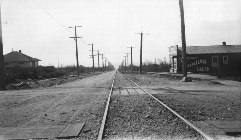 The 4500 block of Dunbar Street at 29th Avenue, looking south along the tracks past Scott's Grocery