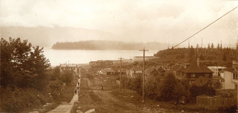 Yew Street from 4th Avenue, looking north down the hill to English Bay and Stanley Park